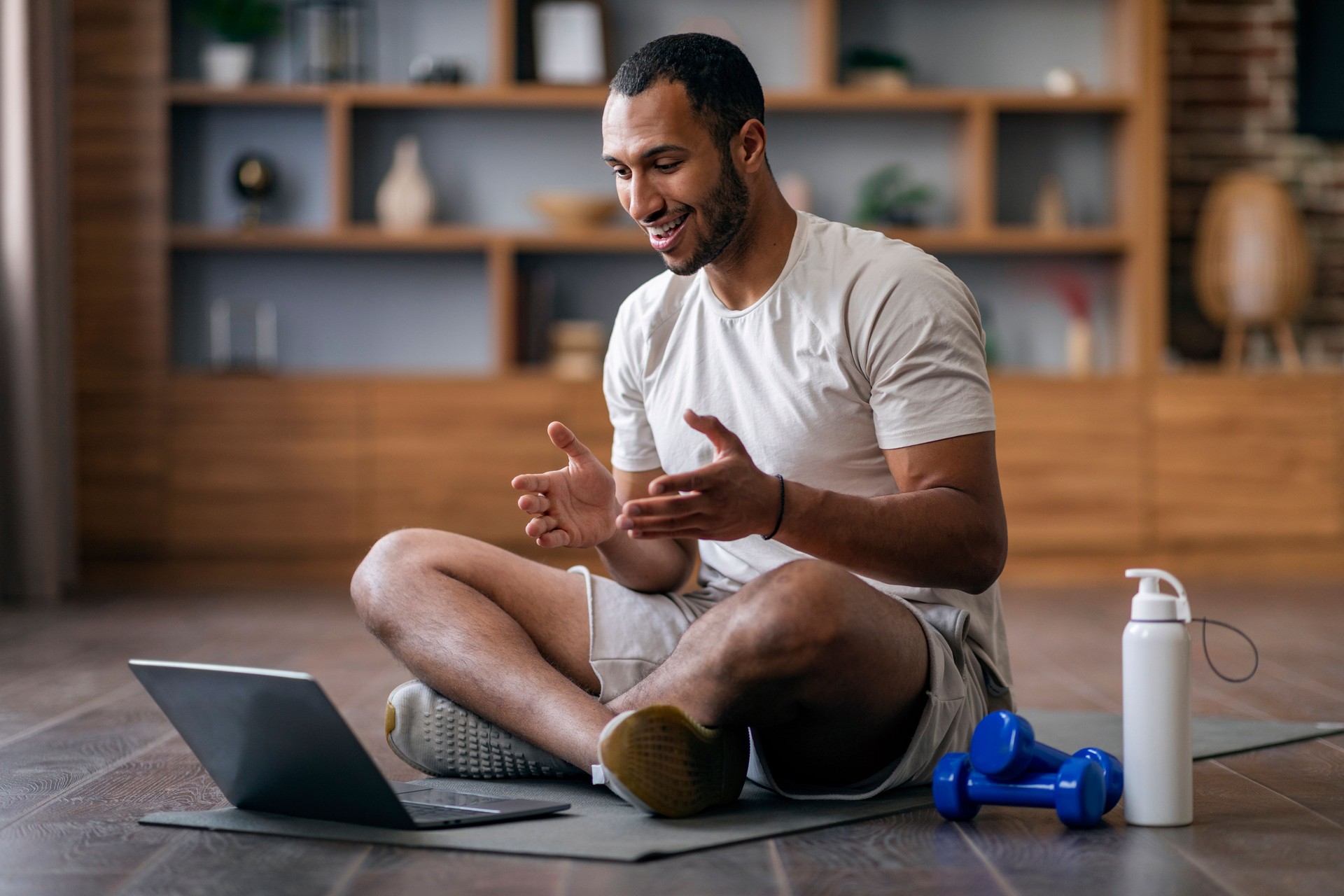 Remote Trainings. Young Black Guy Having Video Call With Sport Coach